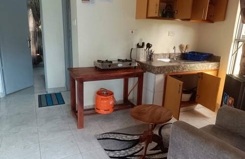 Northern Region Cabaña | Alberto Gardens - Two bedroom cottage in private grounds & free parking