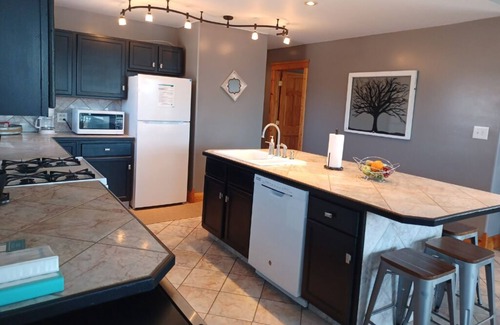 Monticello Casa | Alexander’s Landing Penthouse - Lakefront, Balcony, and Room to Relax