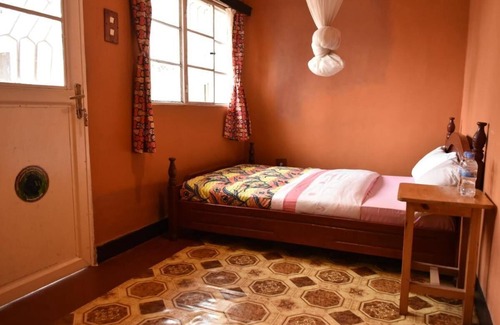 Musanze Cama Y Desayuno | Amahoro Guest House - Habitación doble con baño privado con ducha