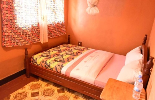 Musanze Cama Y Desayuno | Amahoro Guest House - Habitación doble con baño privado con ducha