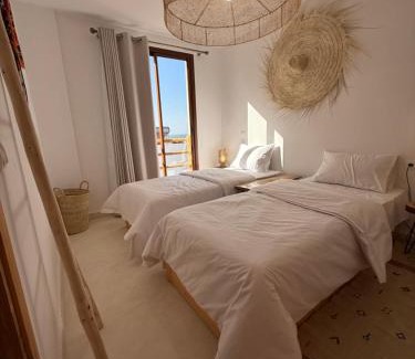 Imsouane Hotel | Aman surf paddle yoga