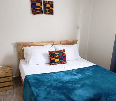 Jinja Apartamento | Amaryllis blue,8mins source to River Nile,secure, peaceful, central great location
