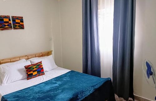Jinja Apartamento | Amaryllis blue,8mins source to River Nile,secure, peaceful, central great location