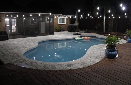 Crooked Creek Casa | Amazing home with heated pool, tiki bar and luscious outdoor close to beaches