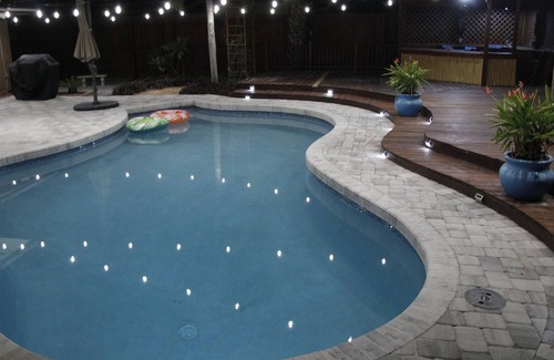 Crooked Creek Casa | Amazing home with heated pool, tiki bar and luscious outdoor close to beaches