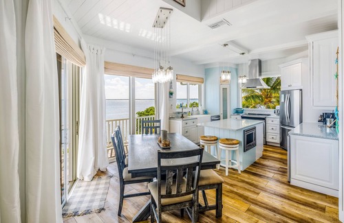 Cutthroat Harbor Estates Casa | Amazing waterfront home with private beach, dock, pool, WiFi & outdoor kitchen