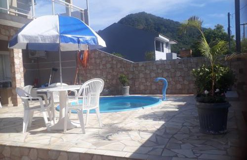Caioba Casa | Ambiente acolhedor com jardim para pets