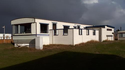 Ballum Casa | AMELAND - Ballum: Stacaravan Chalet (incl. fietsen) bij strand en zee