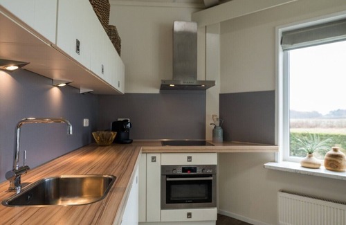 Hollum Casa | Amie a nice holiday home near the golf course, the village of Hollum and nature.