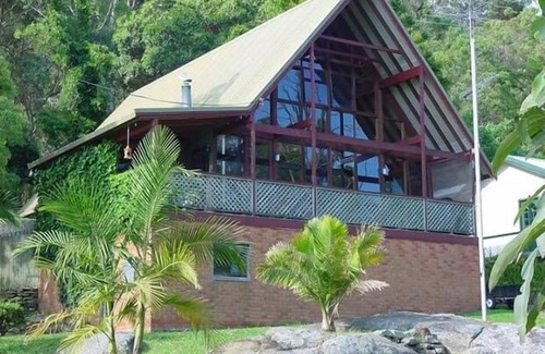 Bar Point Casa | Una escapada de estilo isleño - Impresionante roble A-marco Casa frente al mar Acceso por agua