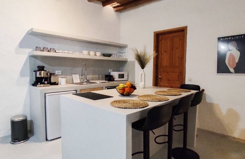 Andros Apartamento | Ancient Stone House Renovated - View of Felos Valley, Seal Mountains and Sunsets