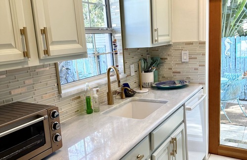 Indian Rocks Beach Cabaña | Angela's Jewel Box Cottage - Storybook home! Walk to beach, restaurants & park.