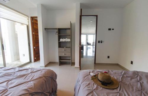 Villa Juarez Apartamento | Angelina 28 Beachfront and Family Apartments - Modern and Relaxing Long Stays - 20 min from Cancun Airport