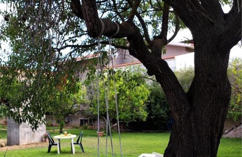 Carbonia Apartamento | Angolo di Natura - casa con giardino in Sardegna
