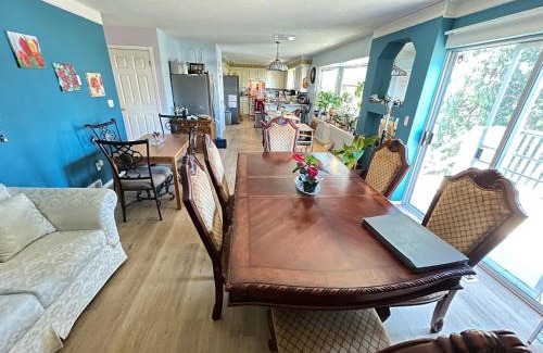 Townline Hill Casa | Anita's Bed & Breakfast - Bedroom On Ground Floor With Backyard Is Downstairs