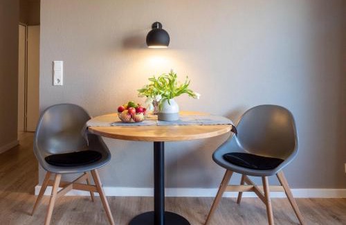 Spiekeroog Apartamento | Antares Spiekerooger Gästehaus-Sonnengartenbalkon SüdWest - Wohnung 4