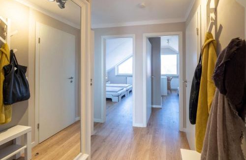 Spiekeroog Apartamento | Antares Spiekerooger Gästehaus-Penthouse mit Blick aufs Wattenmeer - Wohnung 9