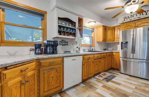Waupaca Casa | Antiquing & Fishing: Riverfront Waupaca Home!