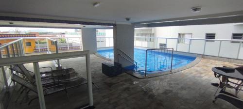 Caicara Apartamento | Apê Pé na Areia, Vista Mar com Varanda Gourmet e Wi-Fi Rápido - Caiçara Praia Grande