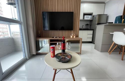 Caicara Apartamento | Apê Pé na Areia, Vista Mar com Varanda Gourmet e Wi-Fi Rápido - Caiçara Praia Grande