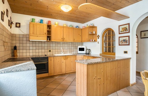 Castello-Molina di Fiemme Apartamento | Apartamento 'Casa Delmarco' con terraza privada y jardín privado