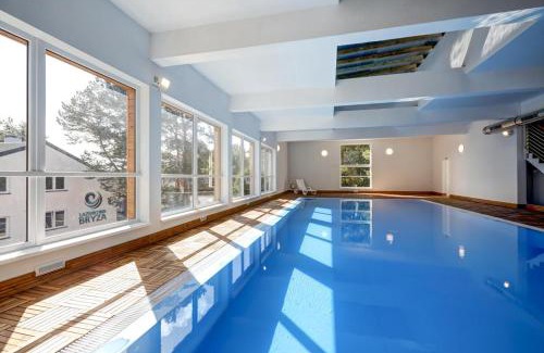 Poddabie Apartamento | Apartament 10B Niebieskie Apartamenty Poddąbie z basenem krytym, odkrytym, salą zabaw, animacjami