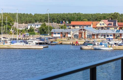 Dziwnow Apartamento | Apartament DZIWNA RIVER z frontowym widokiem na rzekę i basenem Dziwnów EPapartamenty