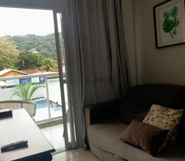 Vila Julia Apartamento | Apartamento 500m Praia da Enseada Guarujá varanda e vaga de garagem