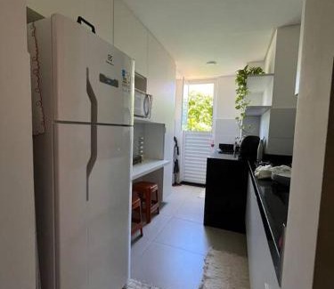 Pium Apartamento | apartamento aconchegante - condomínio mirantes caminho do mar