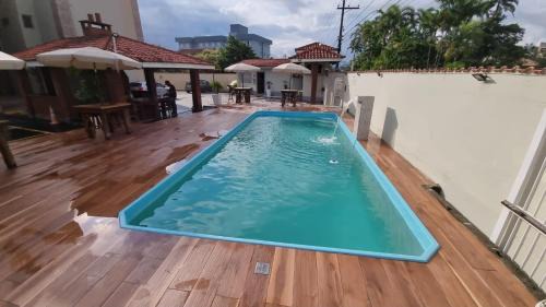 Downtown Ubatuba Apartamento | Apartamento aconchegante com piscina - Praia Grande