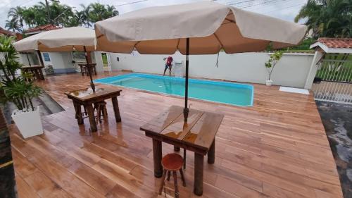 Downtown Ubatuba Apartamento | Apartamento aconchegante com piscina - Praia Grande