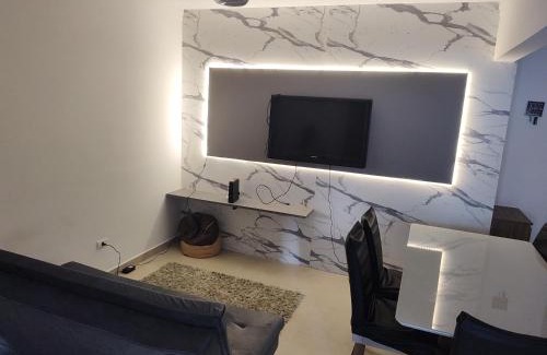 Caicara Apartamento | Apartamento aconchegante, frente praia, vista linda