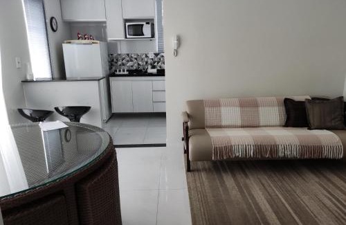 Muriae Apartamento | Apartamento Ar condicionado, varanda, 2 vagas garagem