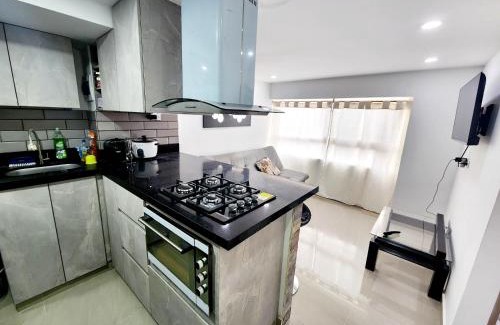 La America Apartamento | Apartamento con Parqueadero y Vista a la Ciudad
