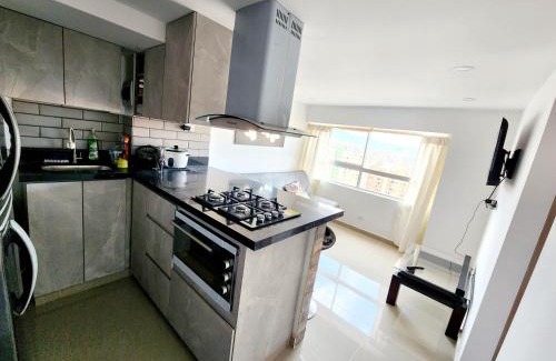 La America Apartamento | Apartamento con Parqueadero y Vista a la Ciudad