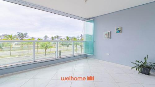 Morada da Praia Apartamento | Apartamento em Bertioga com vista para o mar