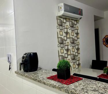Vila Julia Apartamento | Apartamento Enseada Villa Di Fiori com piscina