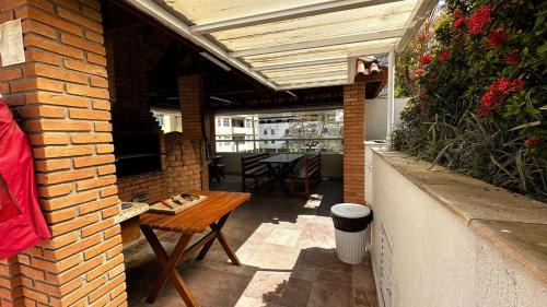 Morro do Maluf Apartamento | Apartamento Frente a Praia de Pitangueiras garagem piscina e sauna