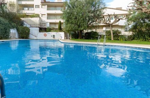 Llanca Apartamento | Apartamento luminoso con jardín, piscina comunitaria y cerca de la playa en Llançà. - ES-228-41