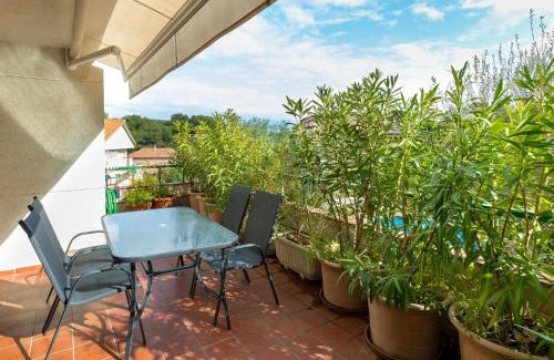 Llanca Apartamento | Apartamento luminoso con jardín, piscina comunitaria y cerca de la playa en Llançà. - ES-228-41