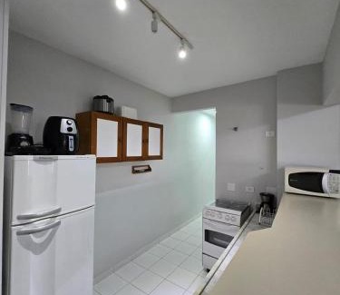 Jardim Sao Miguel Apartamento | Apartamento no Guarujá Praia da Enseada para até 6 pessoas, com Ar Condicionado, a 350 metros - 5 minutos a pé