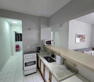 Jardim Sao Miguel Apartamento | Apartamento no Guarujá Praia da Enseada para até 6 pessoas, com Ar Condicionado, a 350 metros - 5 minutos a pé