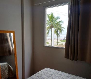 Caicara Apartamento | Apartamento pé na areia e vista mar
