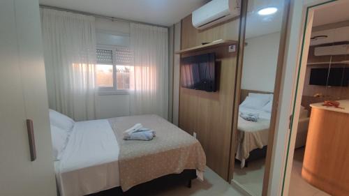 Capao da Canoa Apartamento | Apartamento Sofisticado Ed Del Paine terraço com hidro