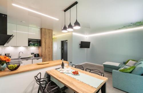 Ustka Apartamento | Apartamenty w sam las by KLIF Ustka - apartament na parterze z tarasem i parkingiem
