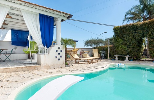 Santa Venera-Portosalvo Apartamento | Apartamento "Ai confini dell Etna 2" con piscina compartida, magníficas vistas y Wi-Fi