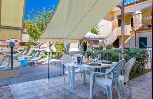 Trinita d'Agultu Apartamento | Apartment L'Oasi Bilo A1 by Interhome