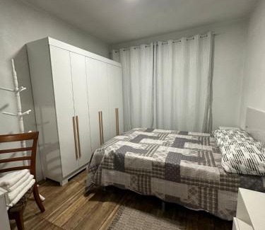 Passo de Torres Apartamento | Apartment 2 blocks from the sea with parking and Wi-Fi