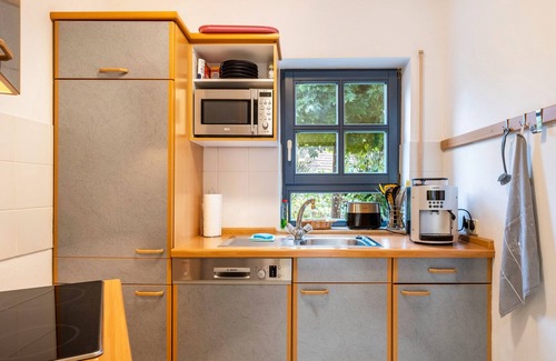 Unterkirnach Apartamento | Apartamento '69 m², planta baja' con terraza compartida, jardín compartido y wifi