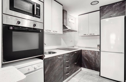 Monte Faro Apartamento | Apartamento 'Adosado En Gran Alacant Santa Pola' con piscina compartida, Wi-Fi y aire acondicionado.